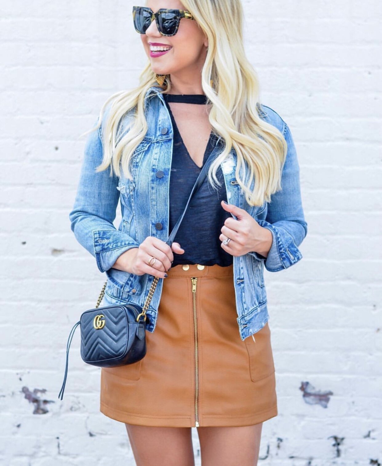  A denim jacket is the ideal way to carry an outfit through into the fall when the temps dip and there is a chill in the air. It ties an outfit together and makes you look “finished.” Read on as I sing the praises of the denim jacket for quite a few reasons and show you several examples of how to wear it! 
